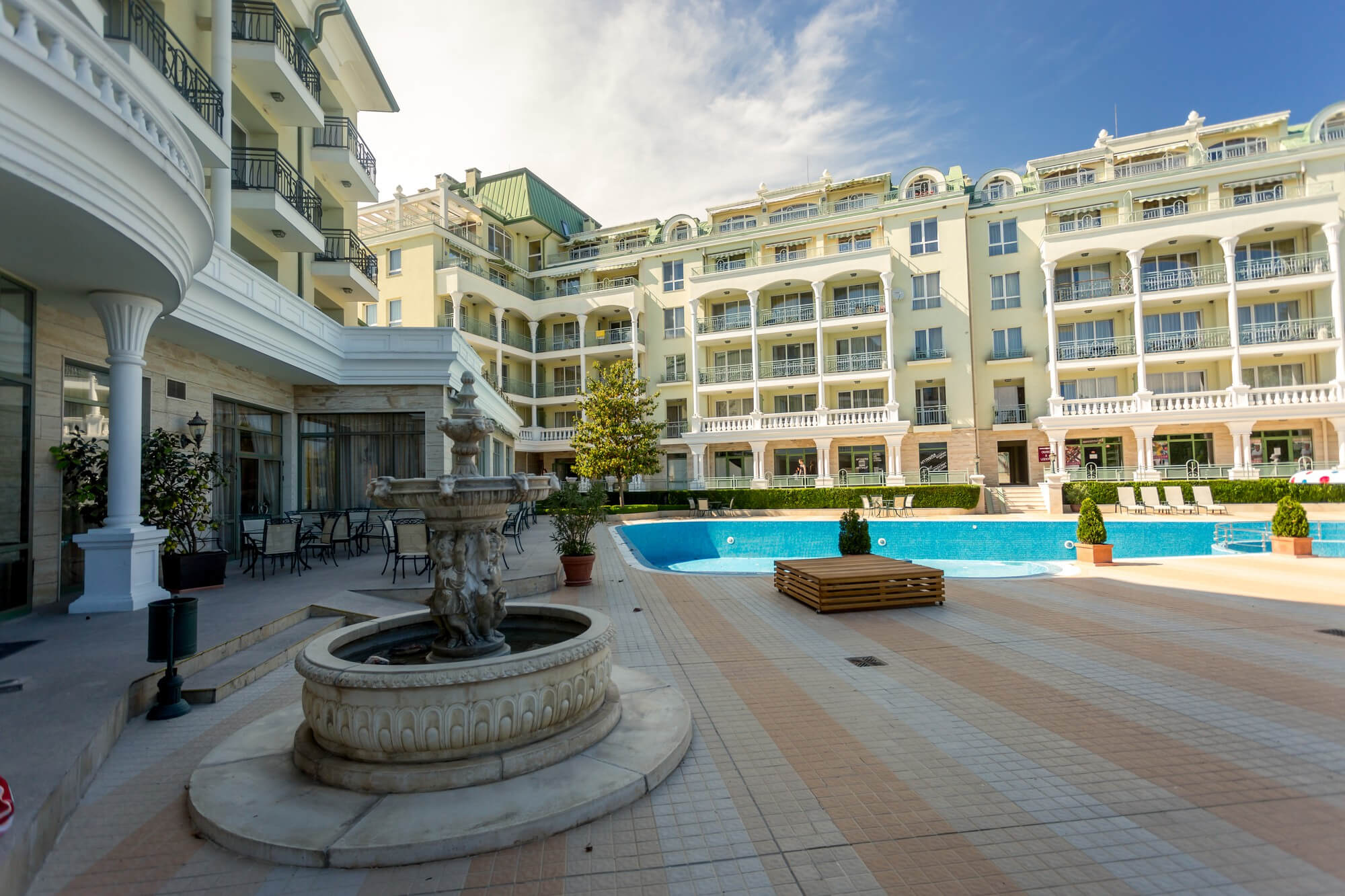 view-poolside-luxurious-hotel-sunny-day