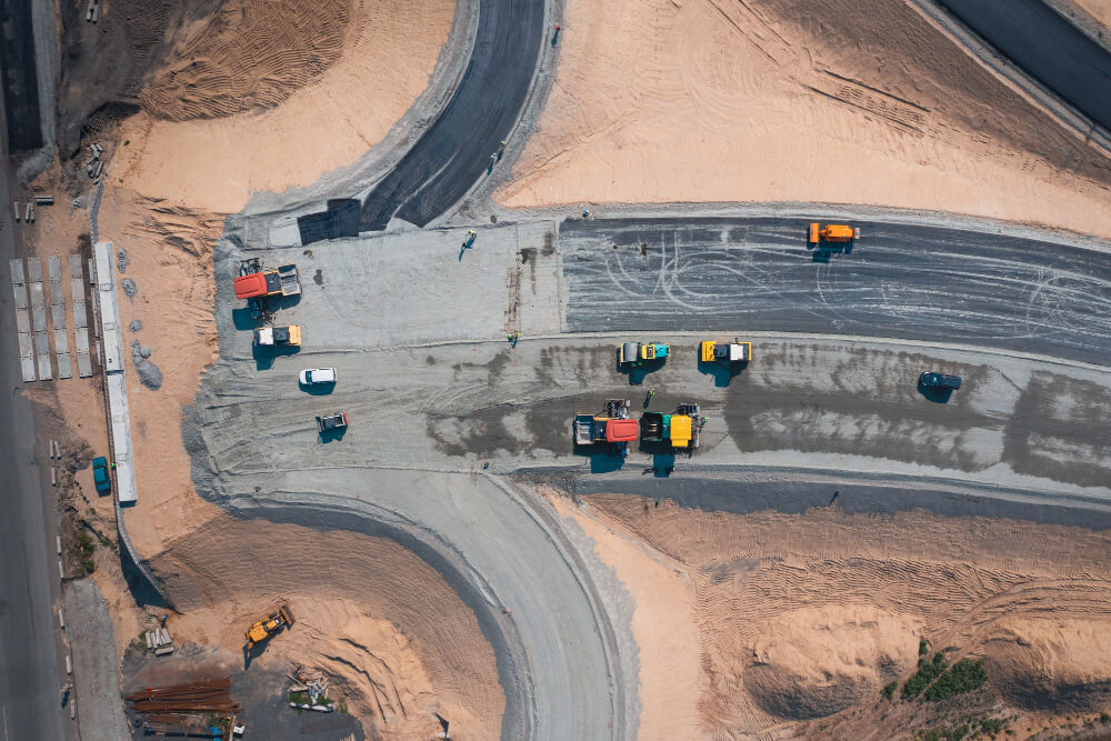 road-construction-wide-asphalt-road-with-help-road-transport-equipment-top-view